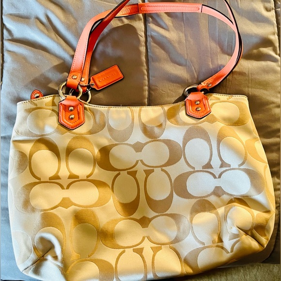 Medium coral and tan Coach bag. Used for 1 night. Basically new! Serial number - Picture 5 of 10